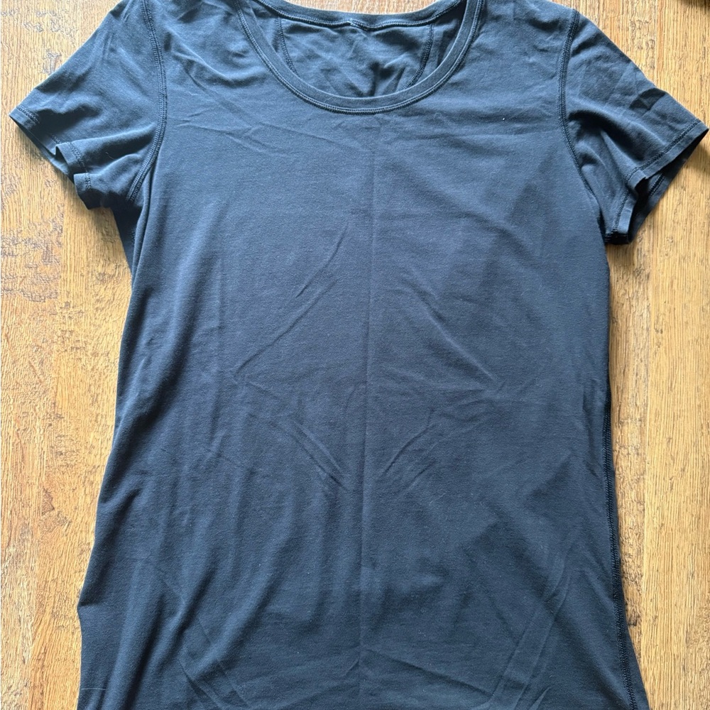 Lululemon Black Women's T-Shirt size 8 (I think)